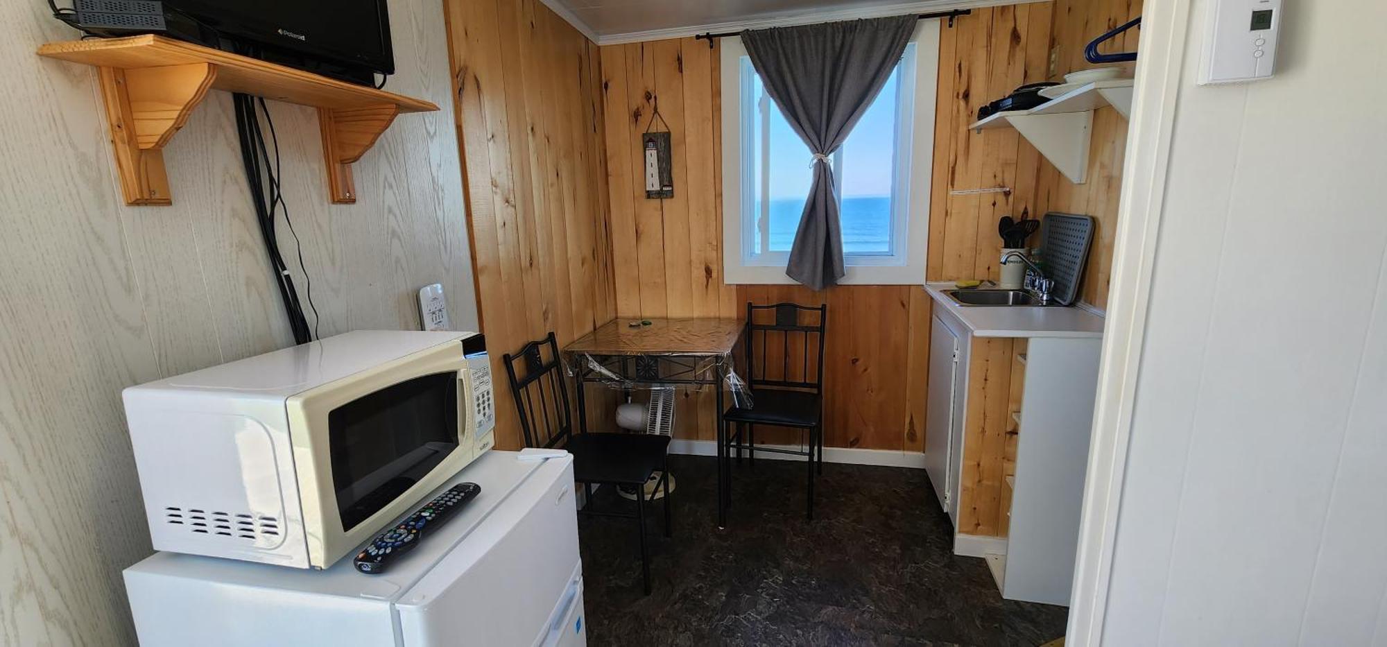 Les Cabines Sur Mer Cap-des-Rosiers Ruang foto