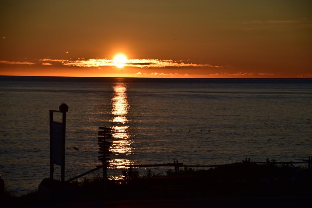 Les Cabines Sur Mer Cap-des-Rosiers Bagian luar foto